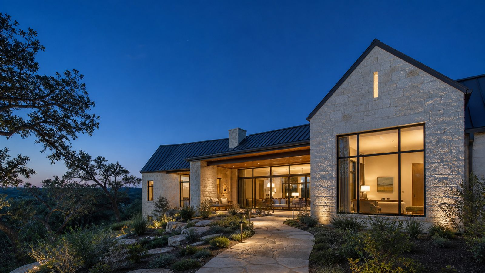 Illustrative image: a Texas Hill Country home exterior at dusk
