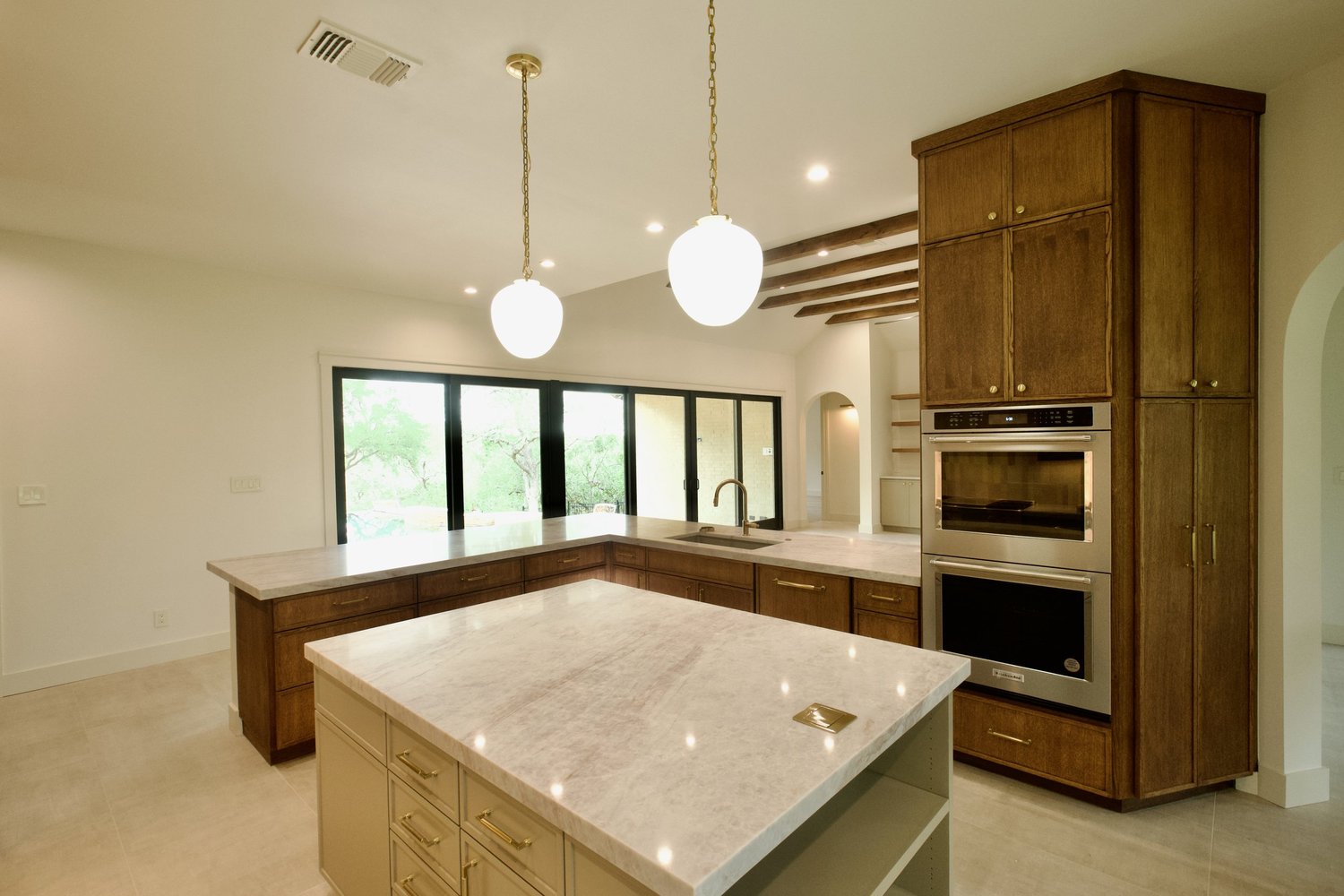 The finished kitchen in Riverbend's San Marcos whole-home renovation