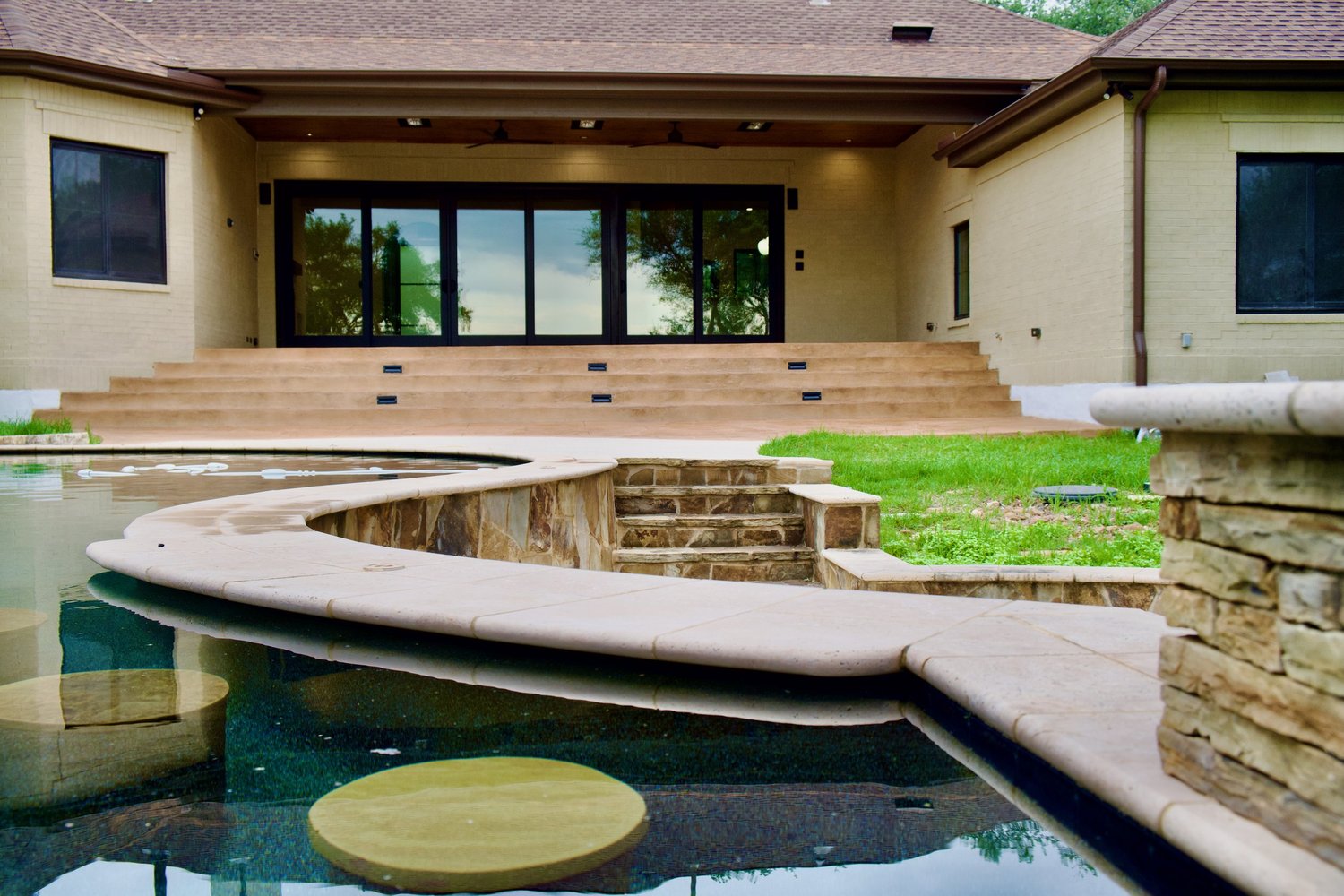 The San Marcos house and pool after Riverbend's whole-home renovation